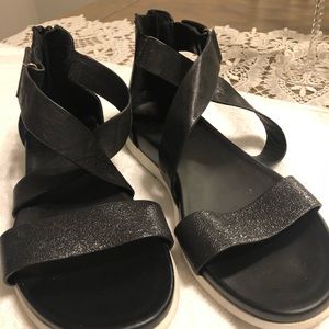 Black flat sandals , casual or dressy , by Sofft .